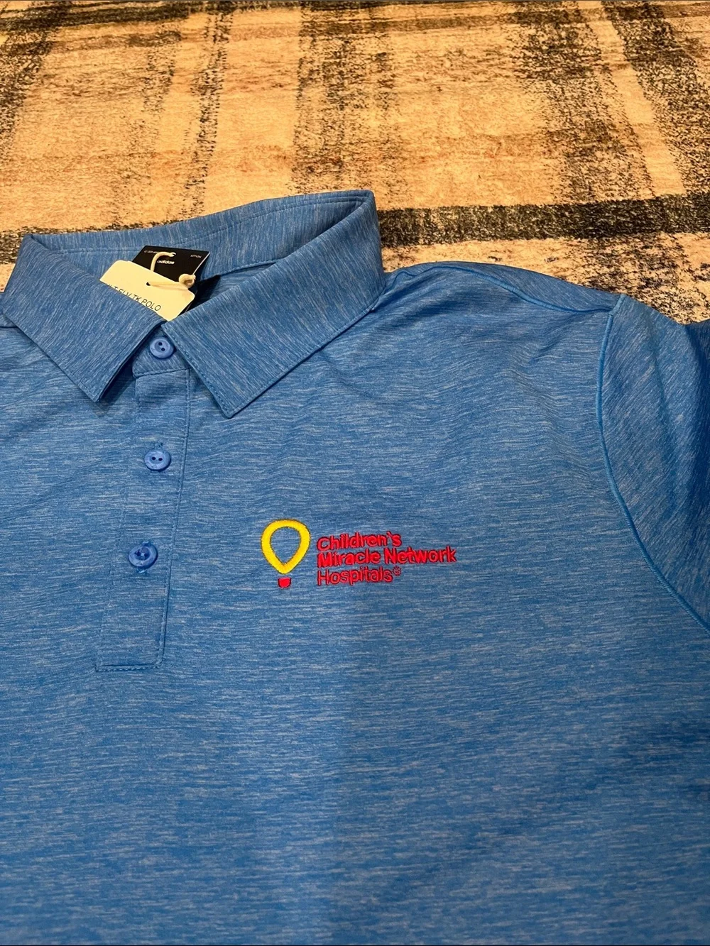 adidas Blue Heather Polo with Children’s miracle network logo